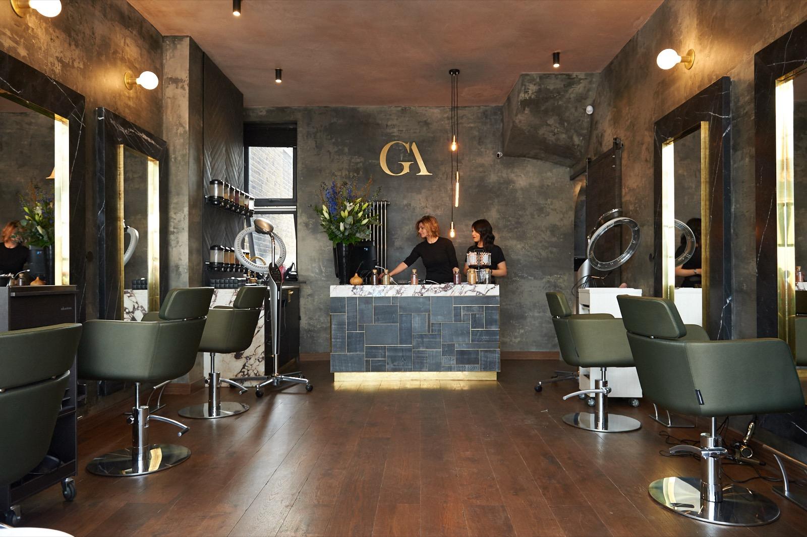 Main salon floor at GA Salons Wimbledon with Italian styling chairs and reception